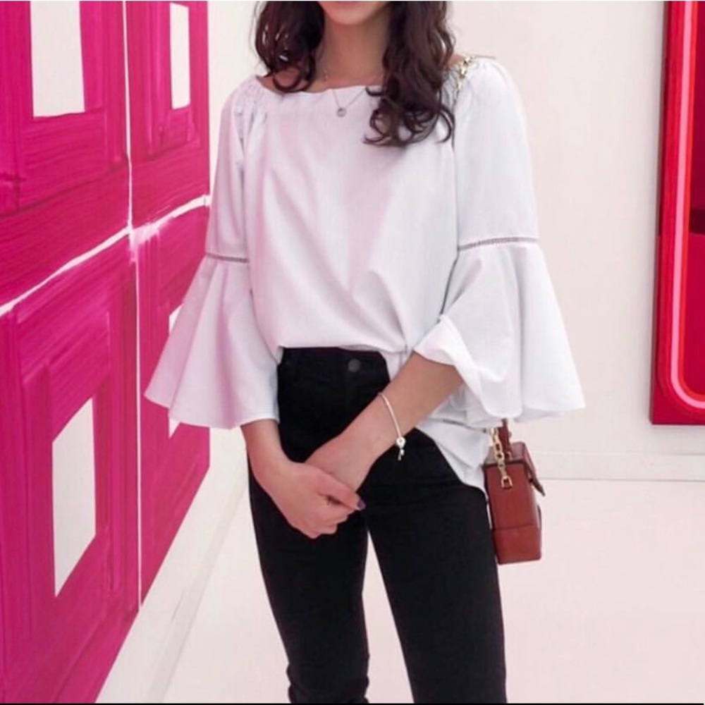 Off the shoulder float white top